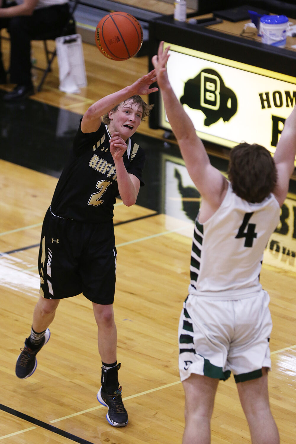 Coy Johnson throws the ball down court